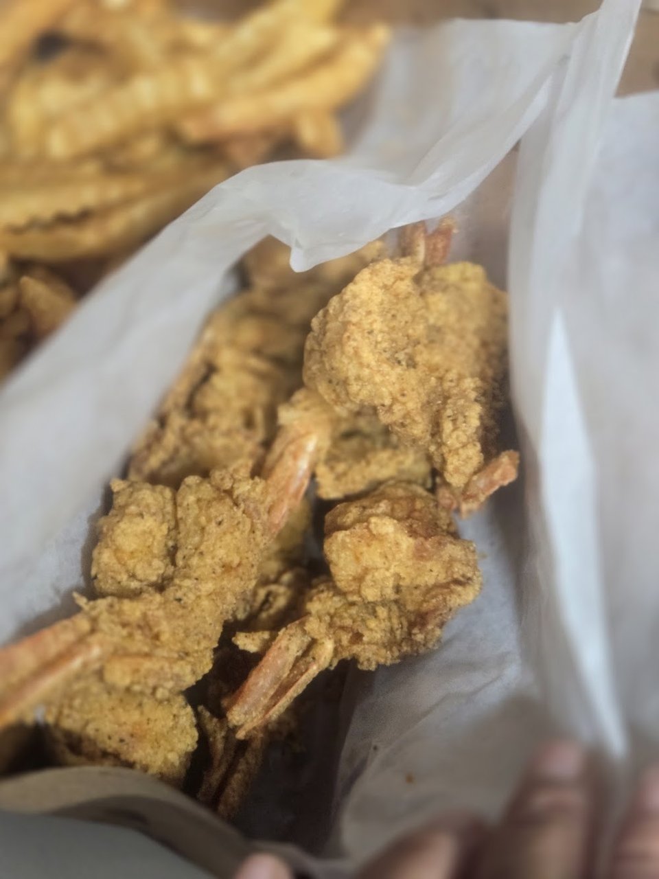Counter menu listing fried fish options